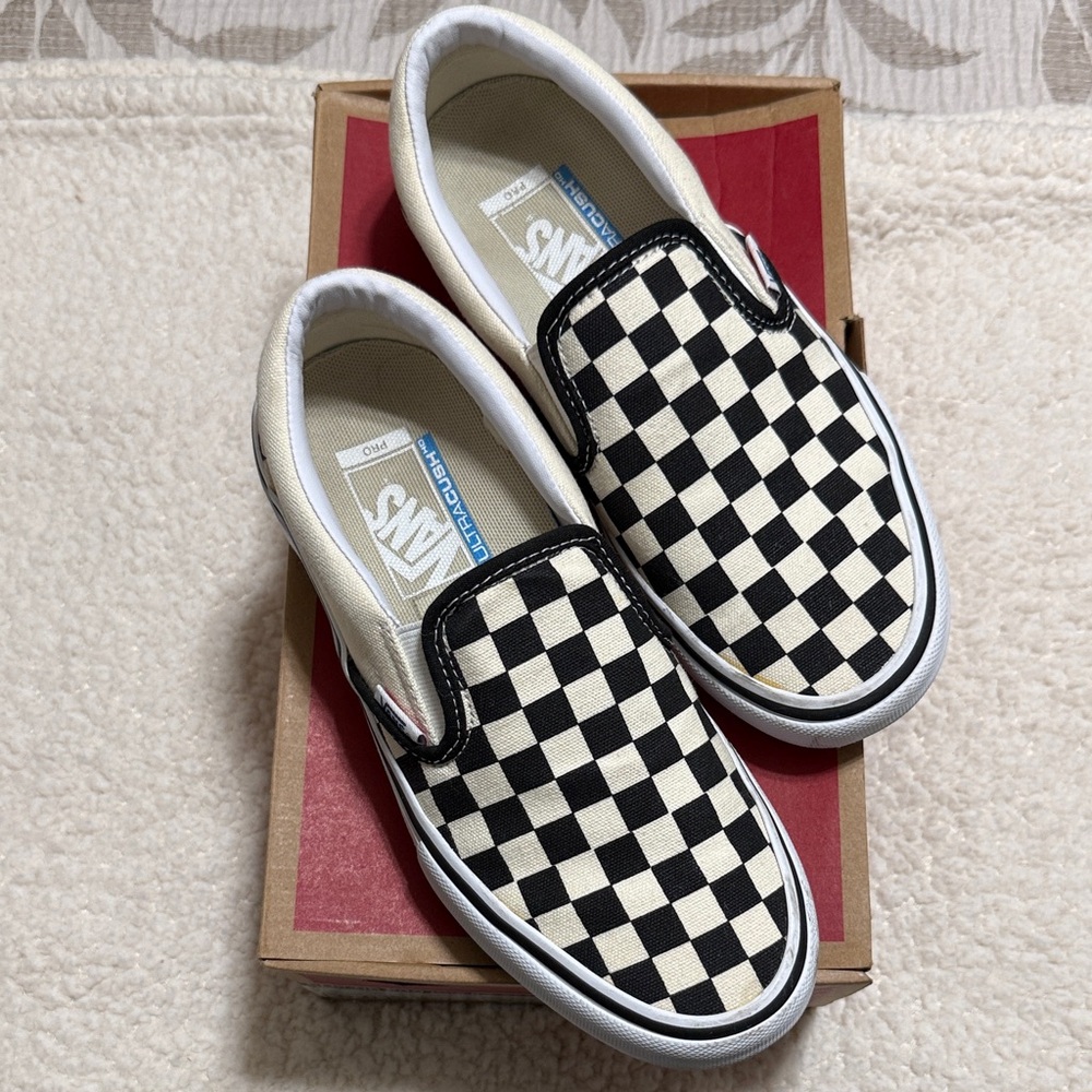 Vans Black and White Checkerboard Slip-Ons